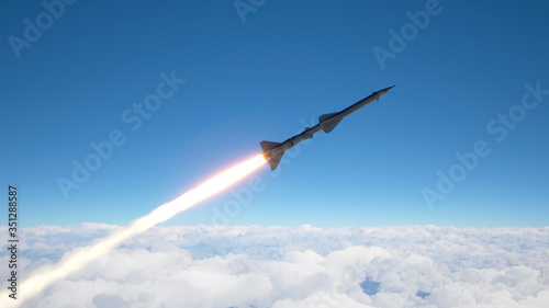 Fotografia Cruise missile fly above the clouds
