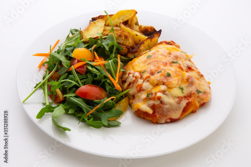 Chicken Parmesan Baked in Tomato Sauce with cheese, chips