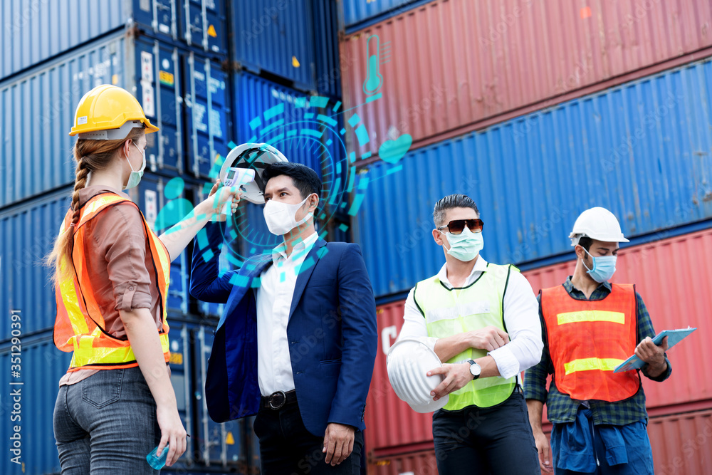 Safety of engineer team or foreman Have a helmet, Body temperature monitor to healthy while working and mask in factory or container. Prevent accident work or dust and Coronavirus. Concept New Normal Safety of engineer team or foreman Have a helmet, Body temperature monitor to healthy while working and mask in factory or container. Prevent accident work or dust and Coronavirus. Concept New Normal