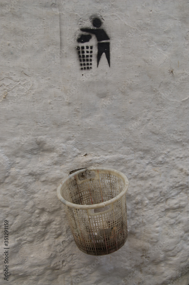 travel to morocco wastebasket on white wall in local market travel to morocco wastebasket on white wall in local market