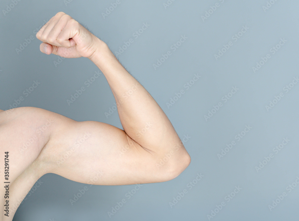 Back arm muscle man with grey background, health care and medical concept Back arm muscle man with grey background, health care and medical concept