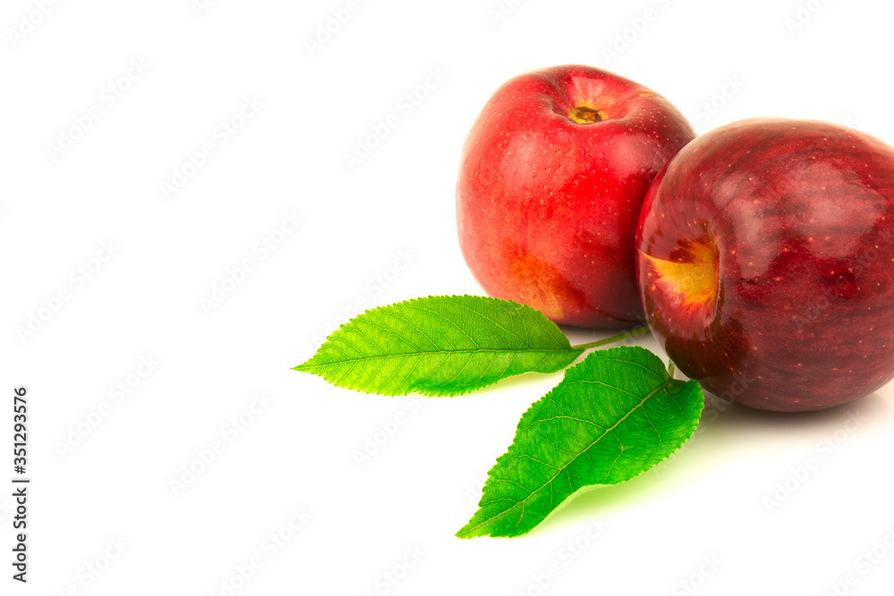 Red apple with green leaves Red apple with green leaves