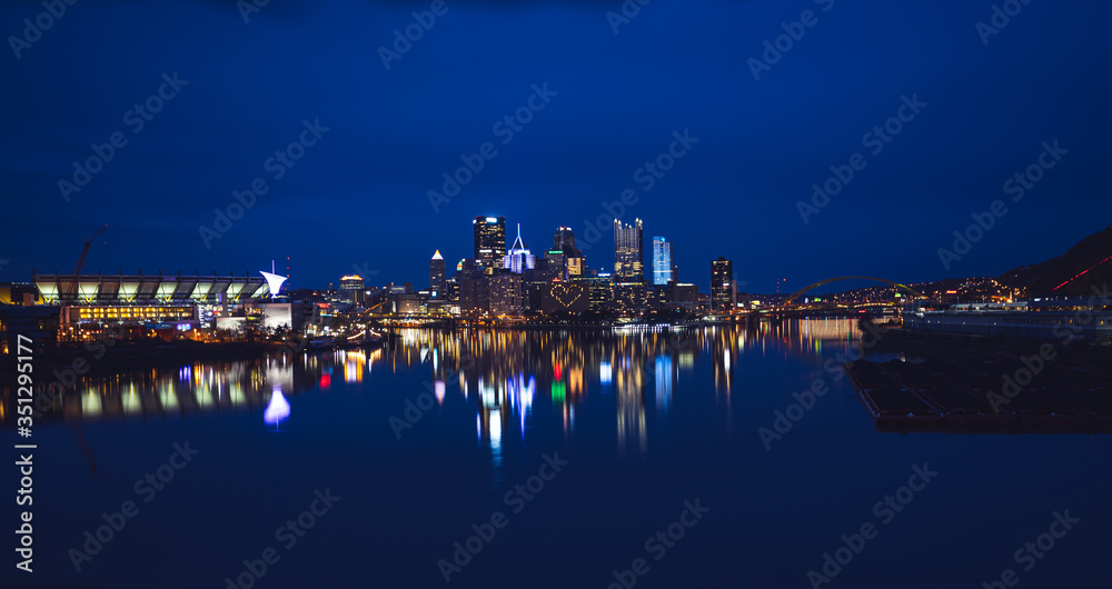 Cold Blue sunrise over Pittsburgh City Skyline.