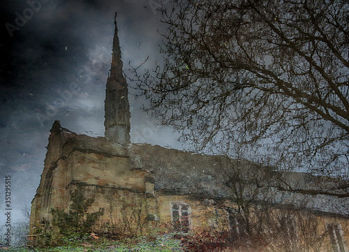 Relfected church in Puddle photo