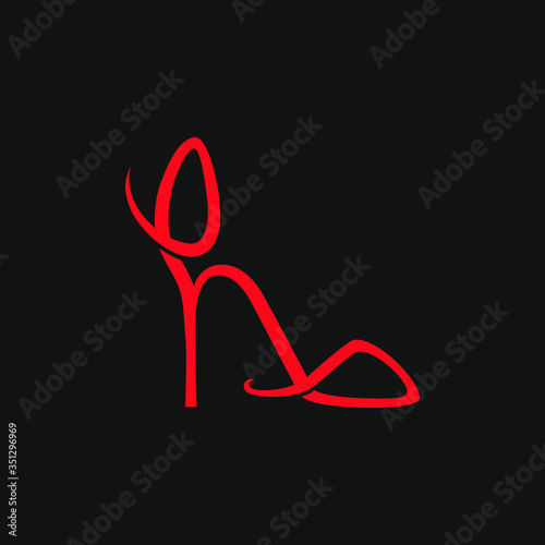 Abstract high heel shoe on black backdrop. Design element