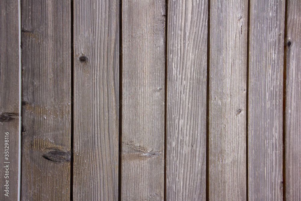 Naklejka premium Dark brown wood veneers perfectly aligned and forming relief