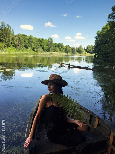 girl in a boat on the lake © pha88