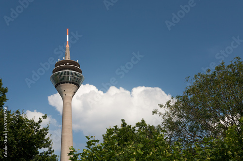 Rheinturm entre arboles photo