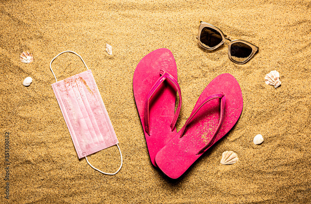 Surgical face mask, pink flip flops and sunglasses - covid-19 vacation Surgical face mask, pink flip flops and sunglasses - covid-19 vacation