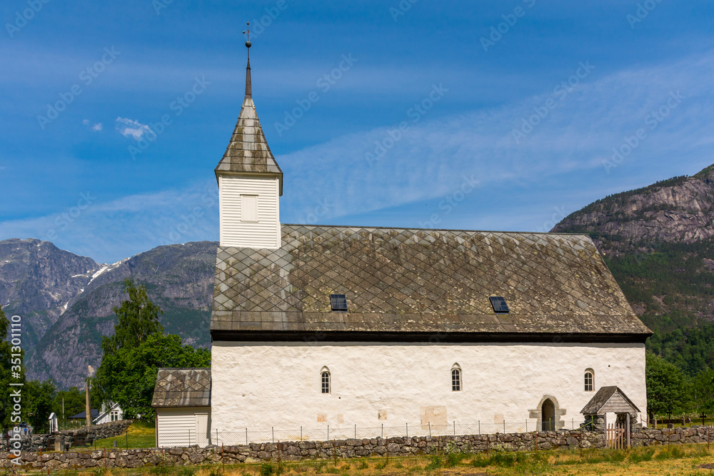 Fototapeta premium the old stone church in Eidfjord, Norway