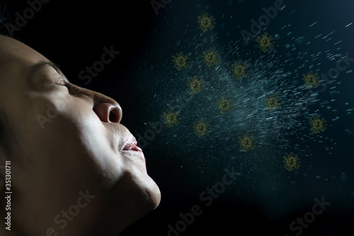 Woman coughing or sneezing. Concept of spread of the virus. Spray infection