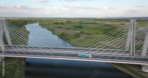 Bridge of Cardinal Franciszek Macharski in Krakow at sunset. photo