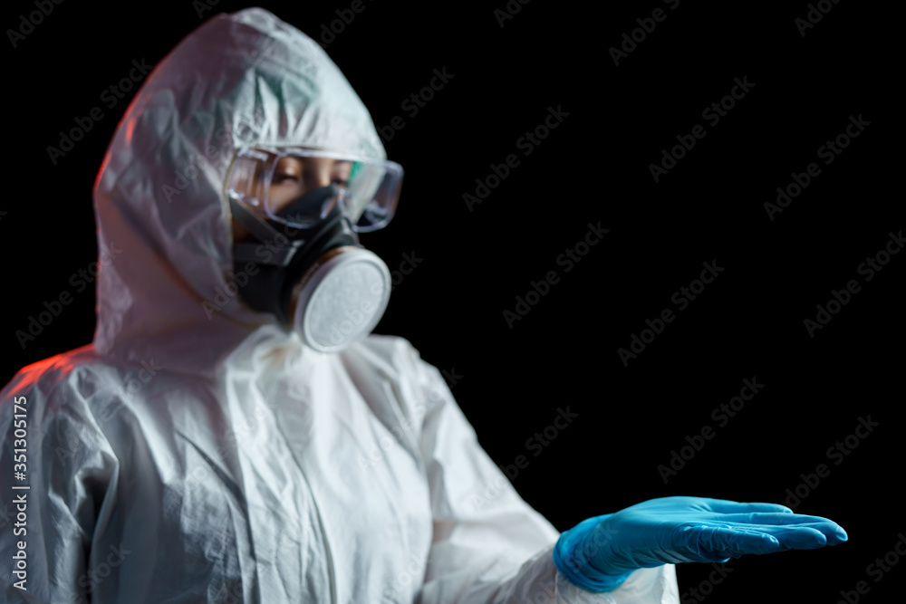 Φωτογραφία Woman in hazmat suit hold out one's hand