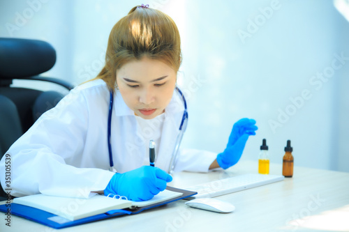 Female doctor work on development the medical experiment in hospital or chemical lap