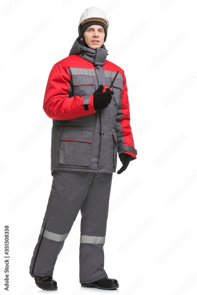 Man in winter workwear and cap isolated view