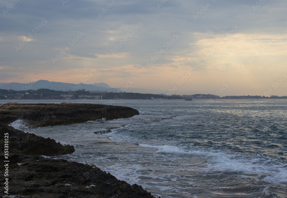 Evening natural landscape of the rocky sea coast