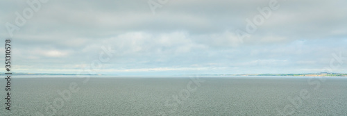 Lake McConaughy, a reservoir on the North Platte River in Nebraska - a panoramic view from the Kingsley Dam on a cloudy morning
 photo