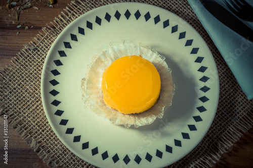 A brazilian dessert made with eggs and coconut. Quindim