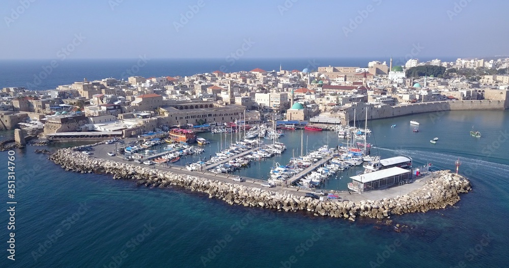 Acre Israel: Aerial footage of the old City and the ancient port and marina.