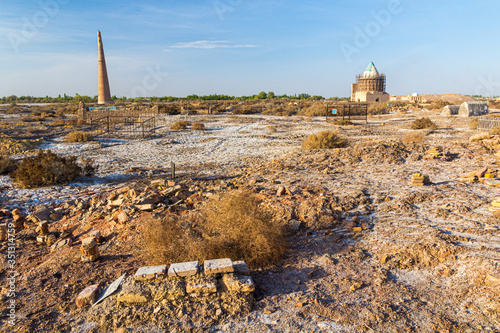 Ruins of ancient Konye-Urgench, Turkmenistan. Kutlug Timur Minaret and Sultan Tekesh Mausoleum visible. photo