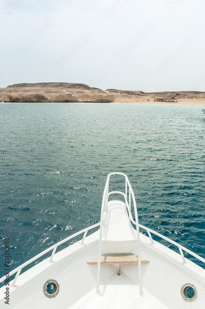 Fototapeta premium Rest on the white yacht (ship) in the Bay of Sharm El Sheikh. Photo on a sunny day..Holidays in 2018.