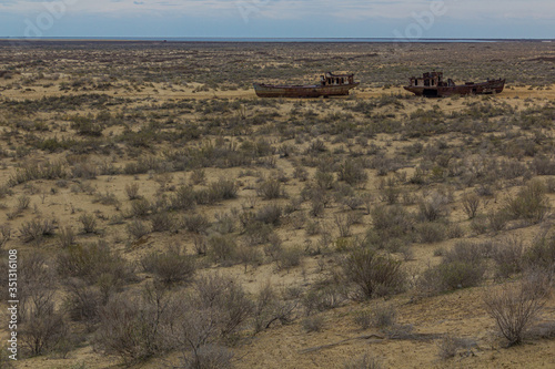 Ship graveyard in former Aral sea  port town Moynaq (Mo‘ynoq or Muynak), Uzbekistan photo