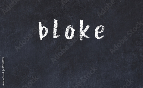 фотографія College chalk desk with the word bloke written on in