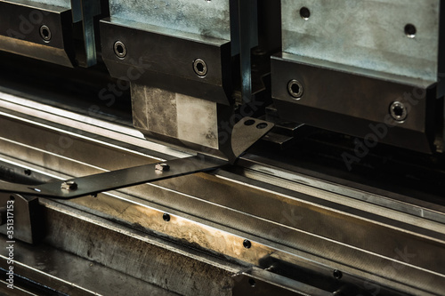 close up of a metal cutting board, production of bent metal