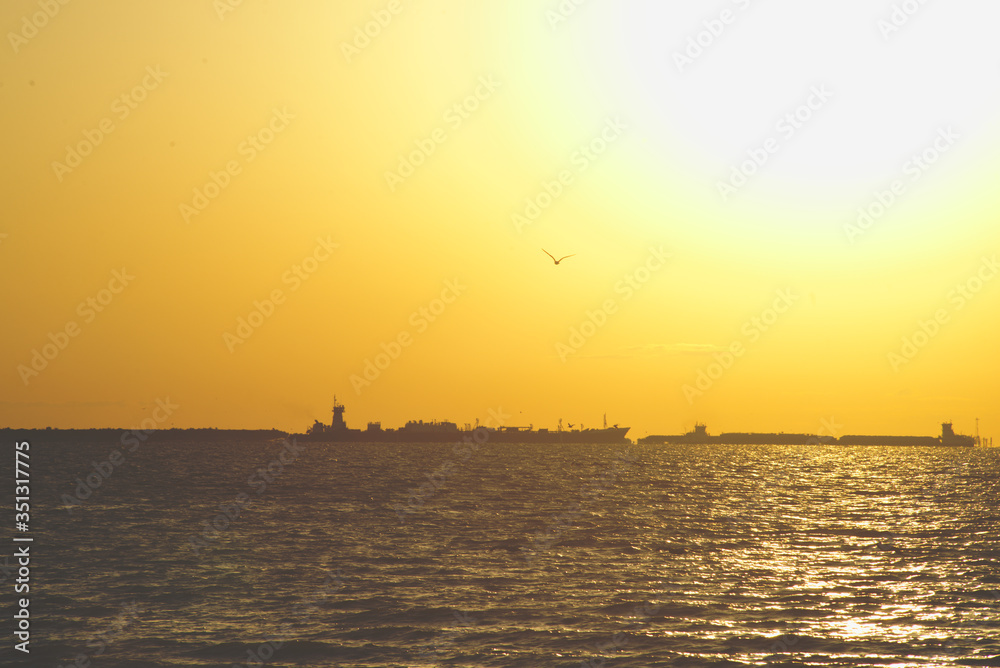 ships passing at sunset ships passing at sunset