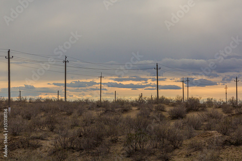 Sunset and power poles in Moynaq (Mo‘ynoq or Muynak), Uzbekistan