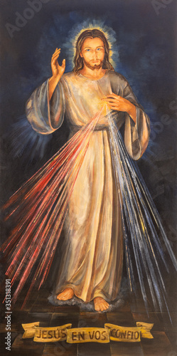 Tableau sur toile BARCELONA, SPAIN - MARCH 3, 2020: The painting of traditional Divine Mercy of Jesus the chruch Iglesia de Belen by artists (Grupo Flama) from half of 20