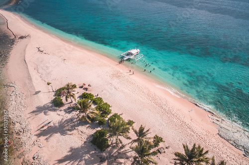 Wallpaper Mural Aerial view of a beautiful virgin white-sand beach and crystal-clear waters of Hagonoy Island Beach in San Agustin, Surigao del Sur, Philippines Torontodigital.ca