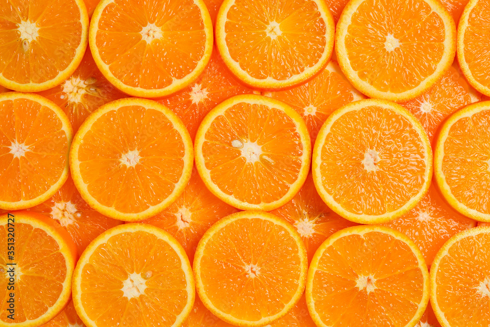 Slices of oranges as a background, top view. Slices of oranges as a background, top view.