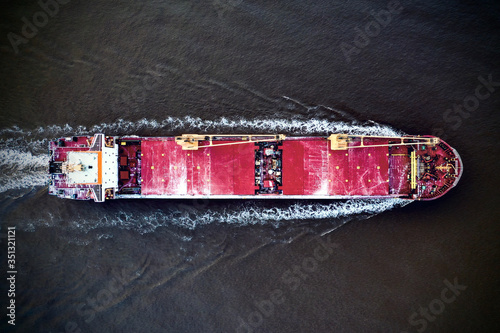 Aerial view of Bulk carrying vessel with cranes top down view River Humber Hull UK