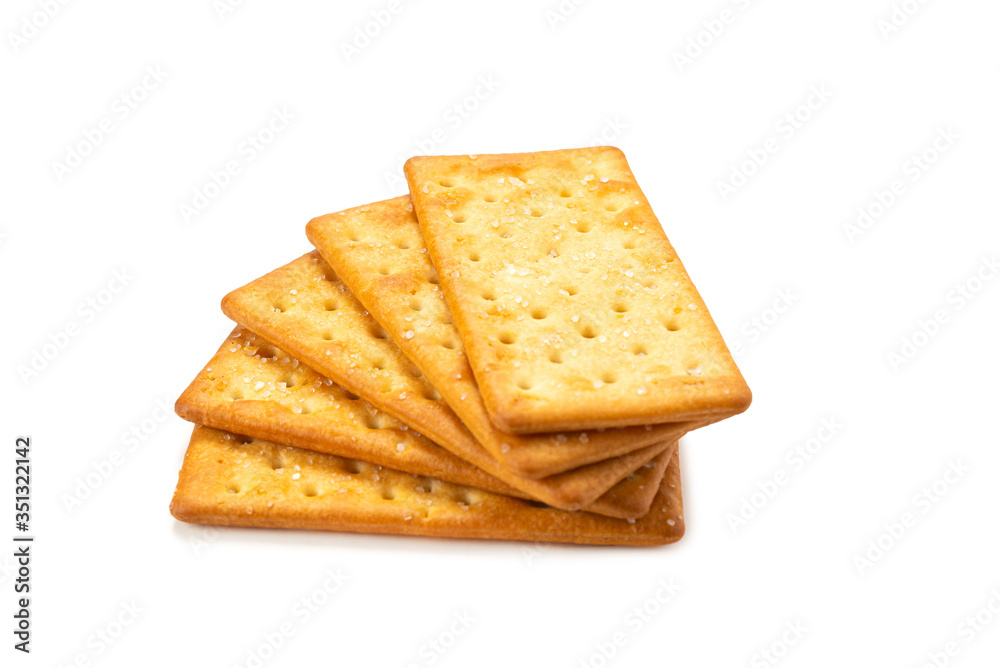 Cracker with salt isolated on white. Cracker with salt isolated on white.