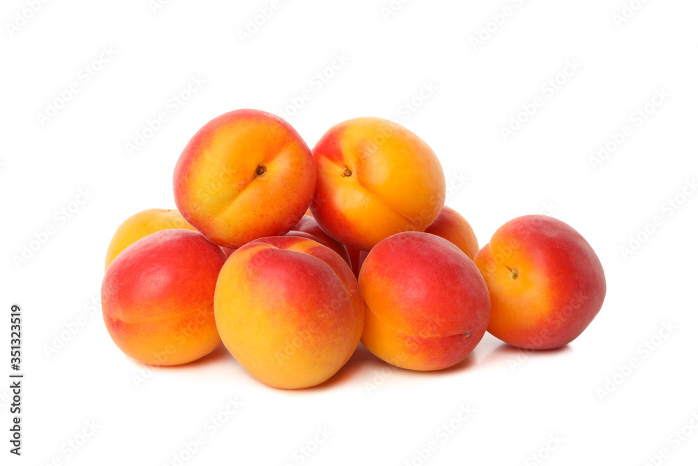 Fresh tasty apricots isolated on white background