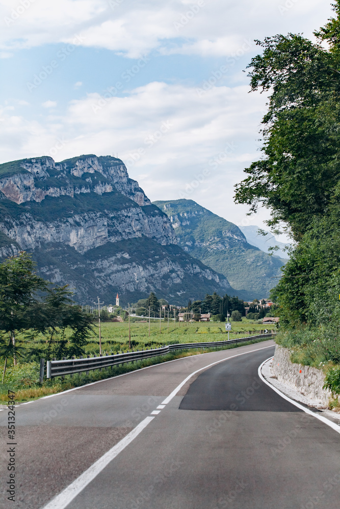 Fototapeta premium Beautiful Summer Mountain Road. Summer road in the mountains.