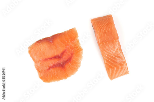 sliced red fish with lemon on white background