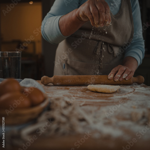 grandmother prepares fresh homemade pasta