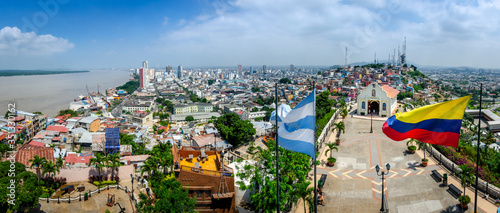 Panoramic photo of Guayaquil, Ecuador, South America, with flag and church from the mirador. Selective focus. photo
