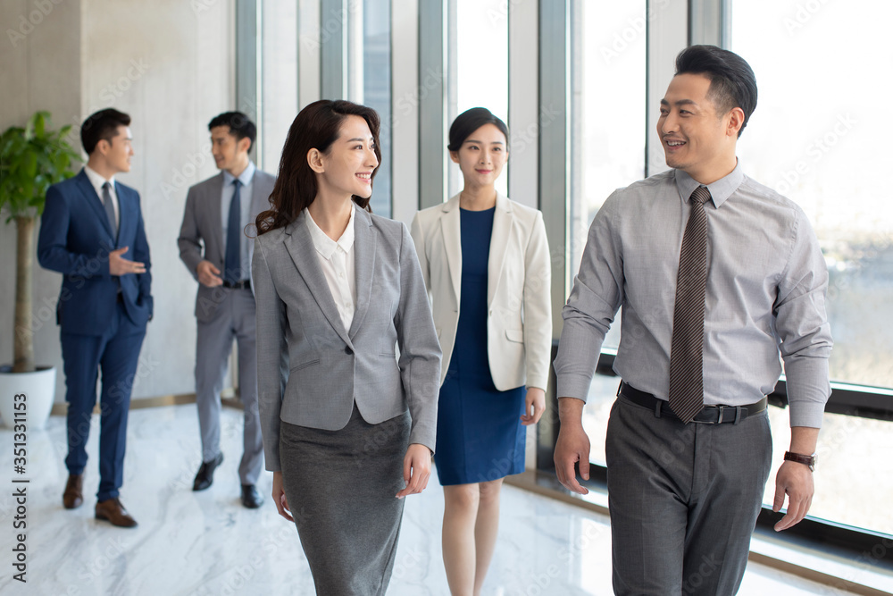 Successful business people talking in office Successful business people talking in office