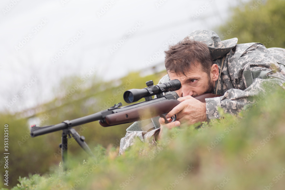 Fototapeta premium shooting a weapon with sniper