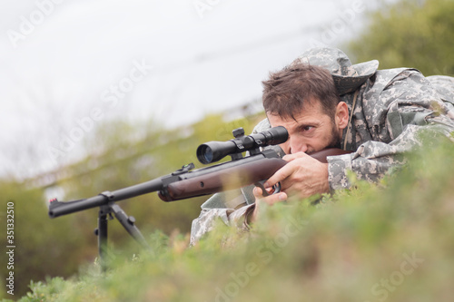 shooting a weapon with sniper