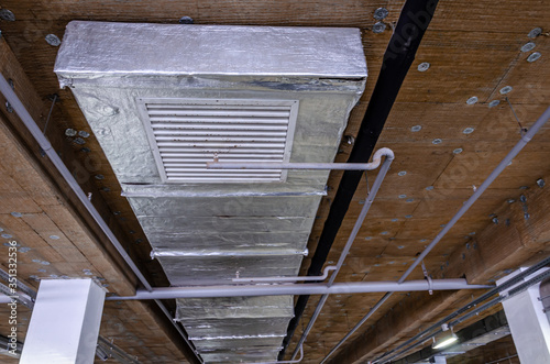 Ceiling insulation, ventilation system air ducts © Alex Images