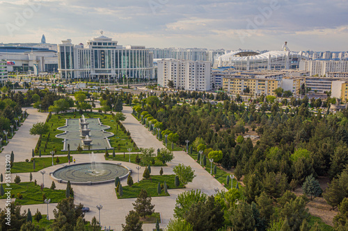 Independence park and new marble-clad buildings in Ashgabat, Turkmenistan photo