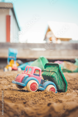 Wallpaper Mural Childhood sandbox concept: Close up of plastic toy truck Torontodigital.ca