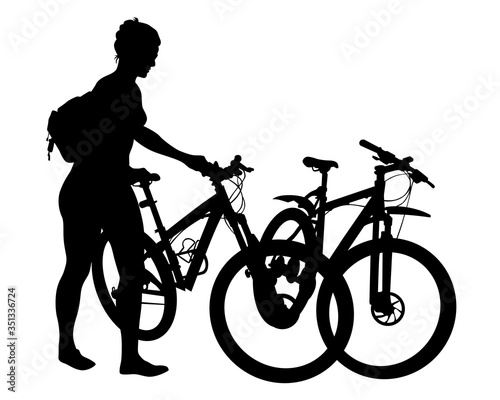 Young athlete women on bike for extreme stunts. Isolated silhouette on a white background