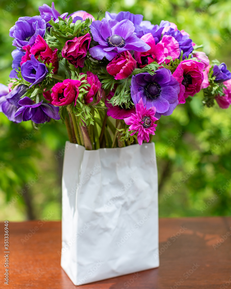 Pink, Purple & Red cut-flower bouquet in a vase.