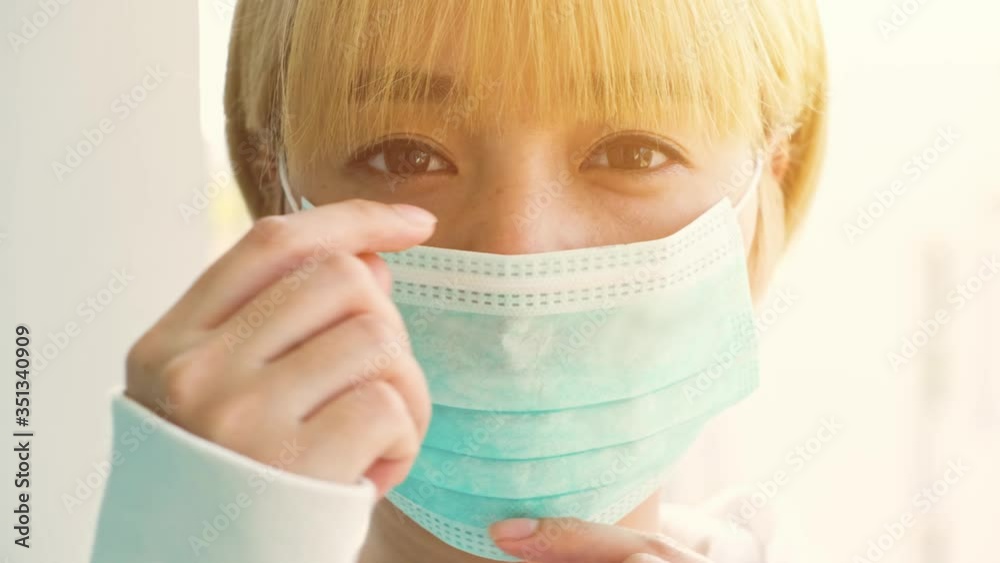 Portrait of woman wearing protective mask, Health care and medical concept, Close up portrait, Concept of health and safety life, N1H1 coronavirus, virus protection Portrait of woman wearing protective mask, Health care and medical concept, Close up portrait, Concept of health and safety life, N1H1 coronavirus, virus protection
