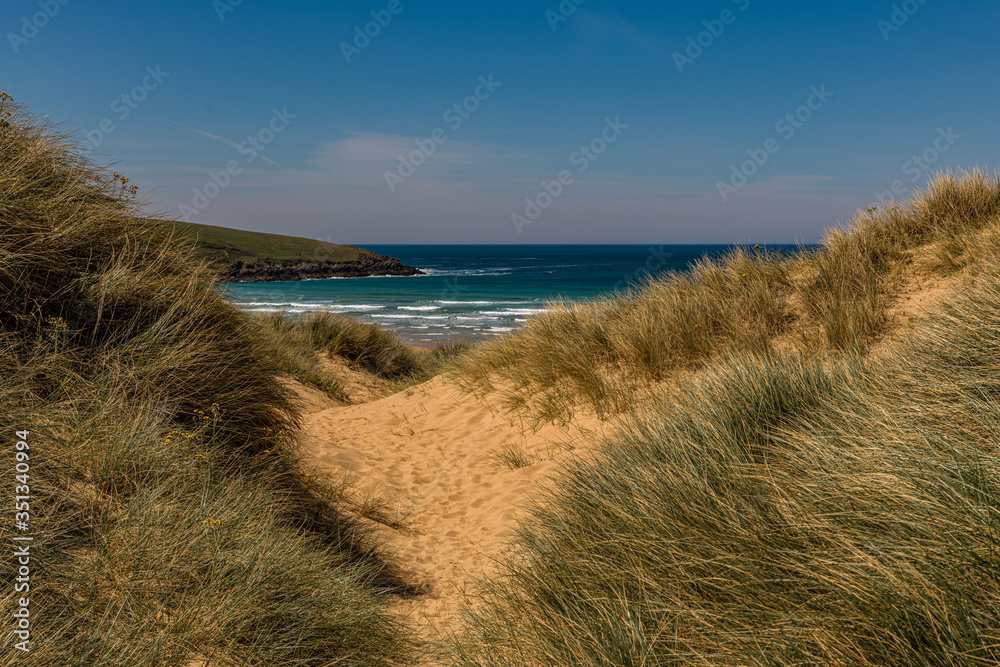 A view to the sea through the dunes at Crantock beach, Cornwall